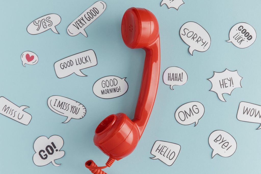 Top View Telephone Receiver With Chat Bubbles - Idro-elettrica S.p.A.